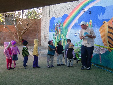 Ari invites children to participate in his sport program .